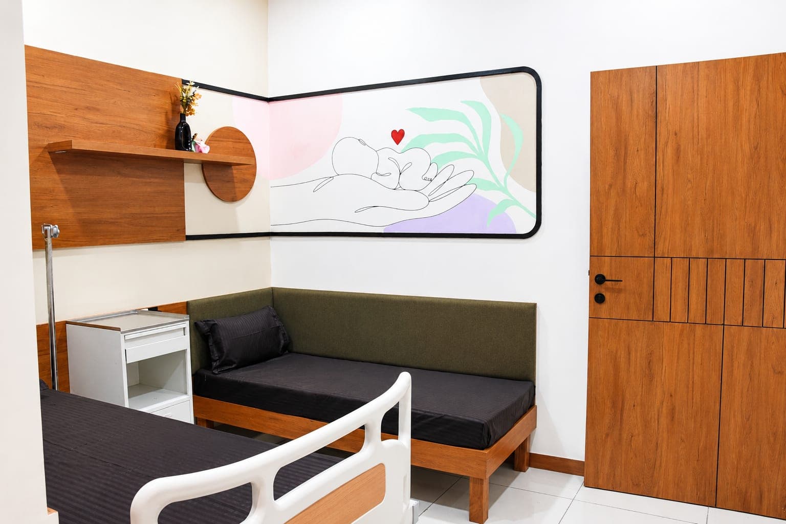 Comfortable patient room for mothers at Krisha Women's Hospital