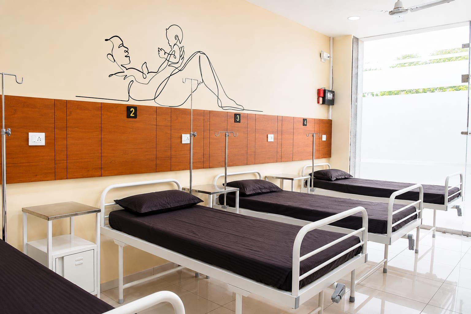 Deluxe patient room at Krisha Women's Hospital